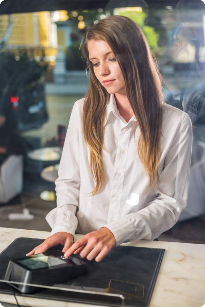 Woman using Taxi Butler Pro device