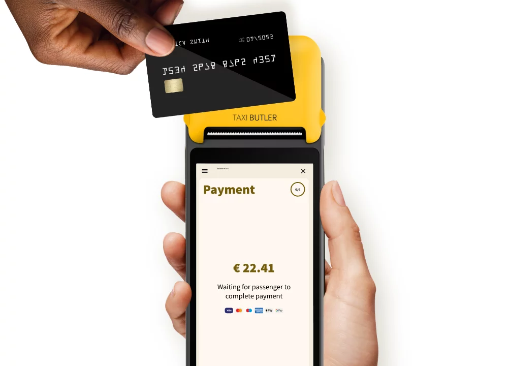 Customer paying with their credit card using Taxi Butler Plus device